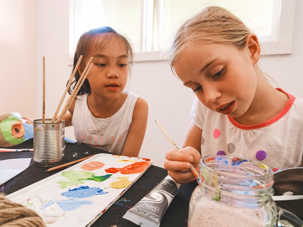 little girls painting.