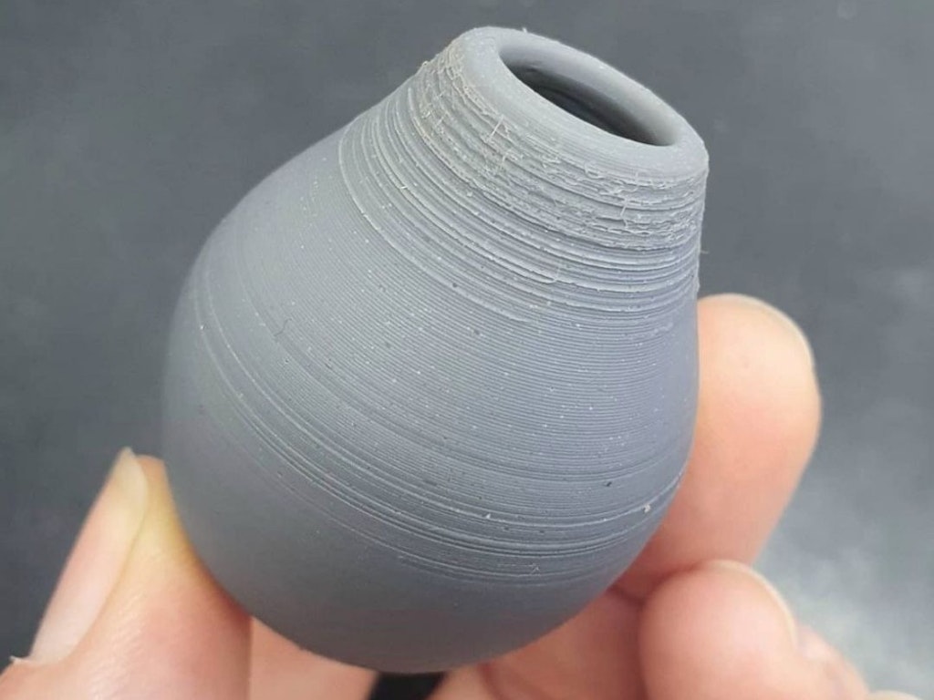 Emily-Copp-Pirouette-2d-printed-rings-in-gold-and-silver