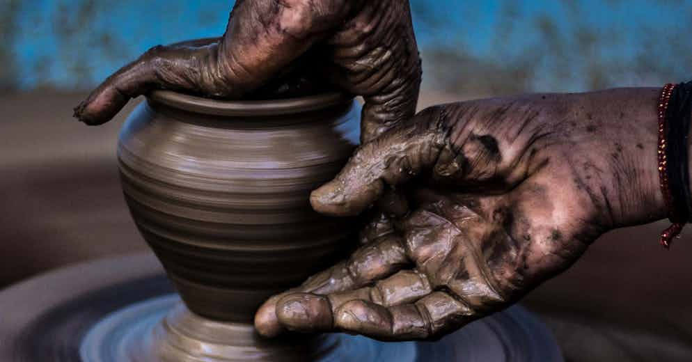 Throwing Clay at the Potter’s Wheel